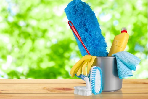 Carpet cleaning team preparing equipment safely before work