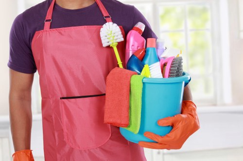 Local cleaner carrying out domestic cleaning in an NW11 home