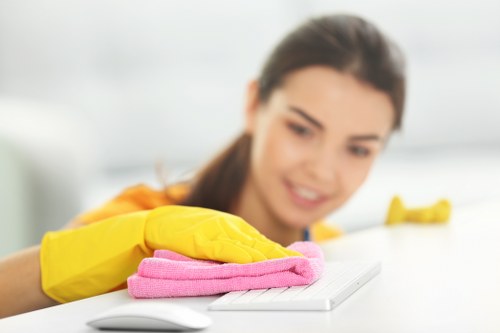 Professional carpet cleaning team following insurance and safety procedures